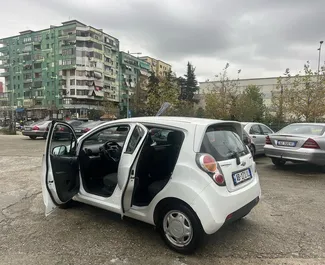 Front view of a rental Chevrolet Spark in Tirana, Albania ✓ Car #7342. ✓ Manual TM ✓ 0 reviews.