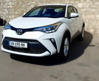 Front view of a rental Toyota C-HR in Tbilisi, Georgia ✓ Car #8143. ✓ Automatic TM ✓ 0 reviews.