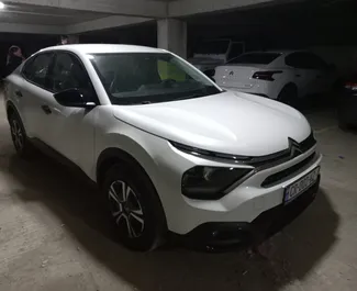 Citroen C4 X 2023 available for rent at Tbilisi Airport, with unlimited mileage limit.