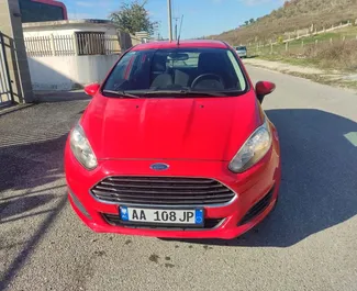 Front view of a rental Ford Fiesta in Tirana, Albania ✓ Car #8250. ✓ Manual TM ✓ 0 reviews.