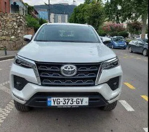 Front view of a rental Toyota Fortuner in Tbilisi, Georgia ✓ Car #8140. ✓ Automatic TM ✓ 0 reviews.
