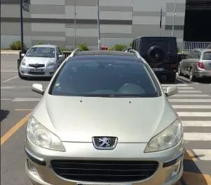 Front view of a rental Peugeot 407 SW in Tirana, Albania ✓ Car #8385. ✓ Automatic TM ✓ 0 reviews.