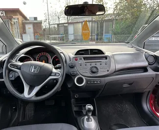 Interior of Honda Jazz for hire in Albania. A Great 5-seater car with a Automatic transmission.