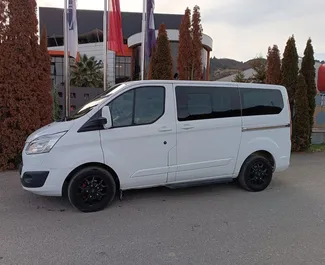 Front view of a rental Ford Tourneo Custom in Tirana, Albania ✓ Car #9033. ✓ Automatic TM ✓ 0 reviews.