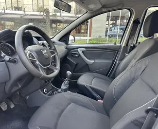 Interior of Dacia Duster for hire in Albania. A Great 5-seater car with a Manual transmission.
