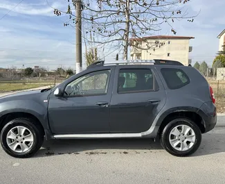 Dacia Duster 2015 car hire in Albania, featuring ✓ Diesel fuel and 109 horsepower ➤ Starting from 23 EUR per day.