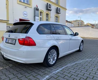 Petrol 2.0L engine of BMW 3-series Touring 2011 for rental in Prague.