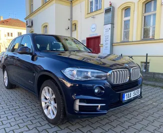 Front view of a rental BMW X5 in Prague, Czechia ✓ Car #385. ✓ Automatic TM ✓ 1 reviews.