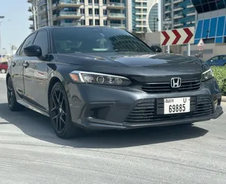 Honda Civic 2023 car hire in the UAE, featuring ✓ Petrol fuel and 158 horsepower ➤ Starting from 150 AED per day.