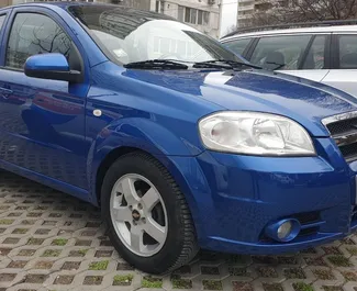 Front view of a rental Chevrolet Aveo at Burgas Airport, Bulgaria ✓ Car #9654. ✓ Automatic TM ✓ 0 reviews.